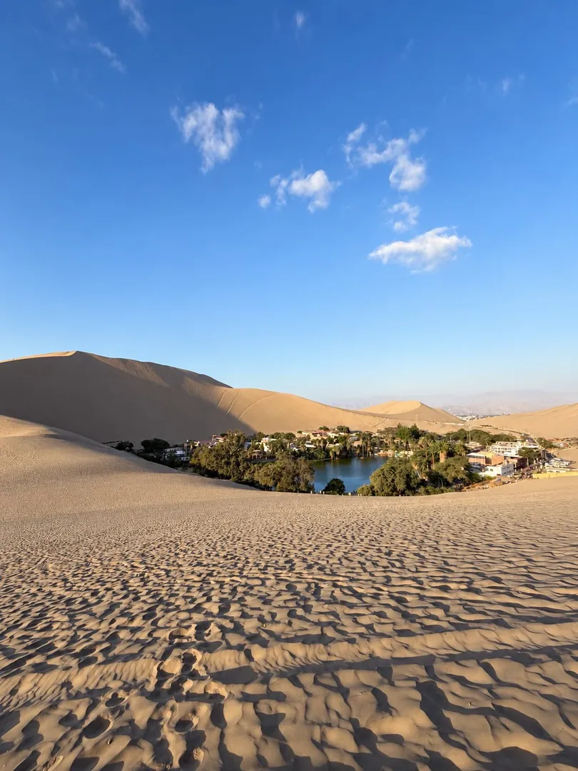 Huacachina oasis surrounded by dunes